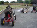 Picture of student riding a go cart at Farmer Teds